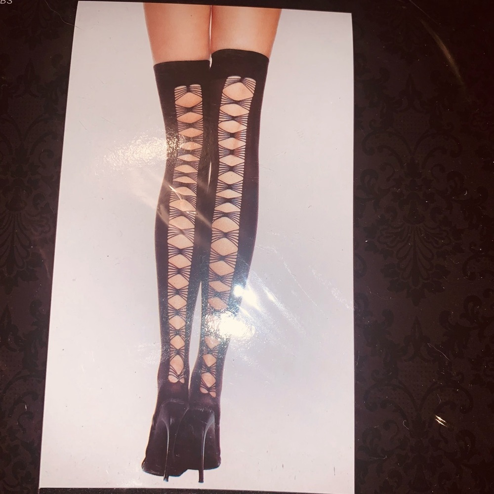Thigh high black cut up back